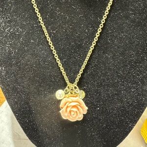 Clair’s gold tone rose faux pearl necklace
